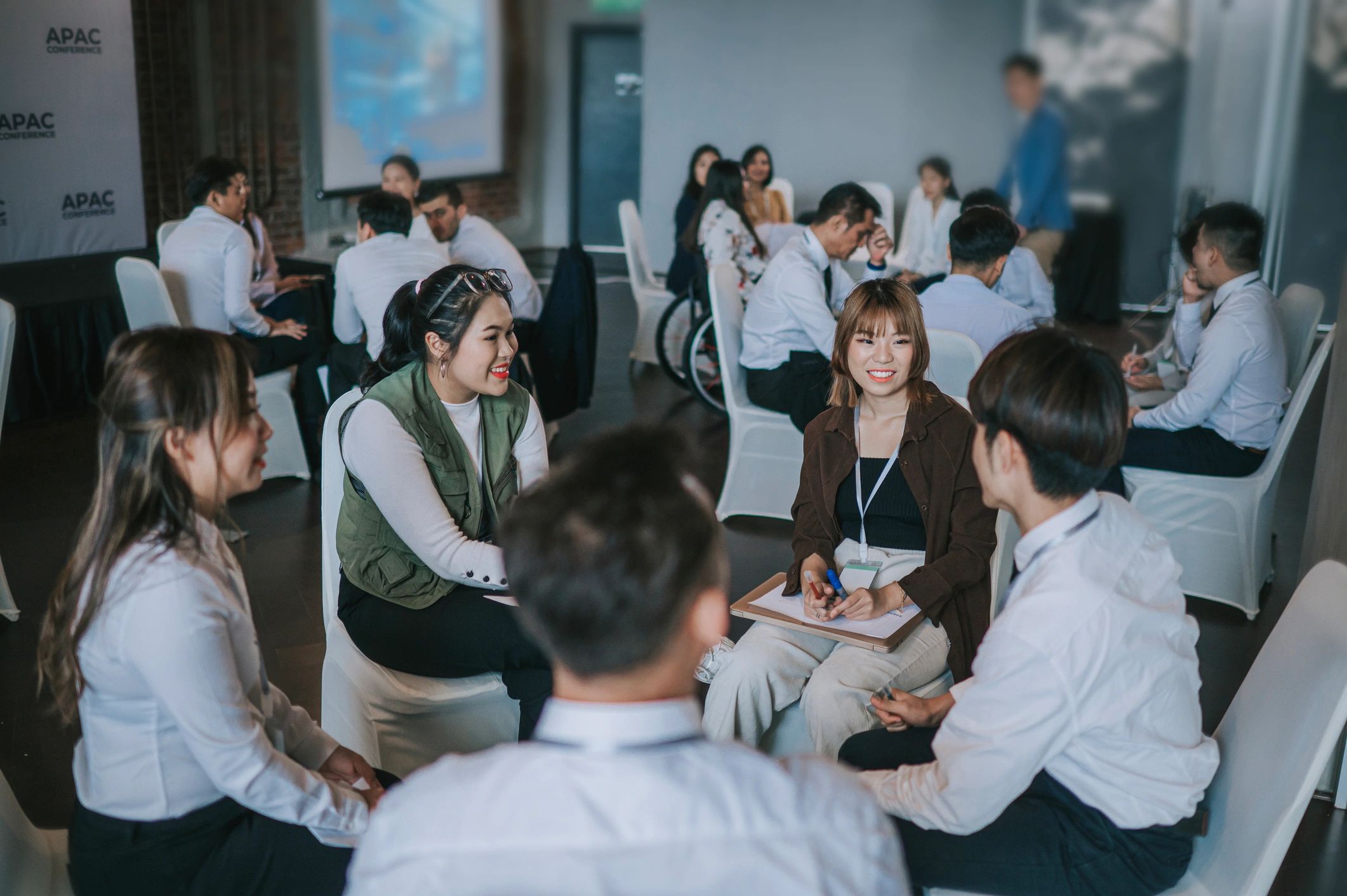 Workshop participants collaborating on business strategy