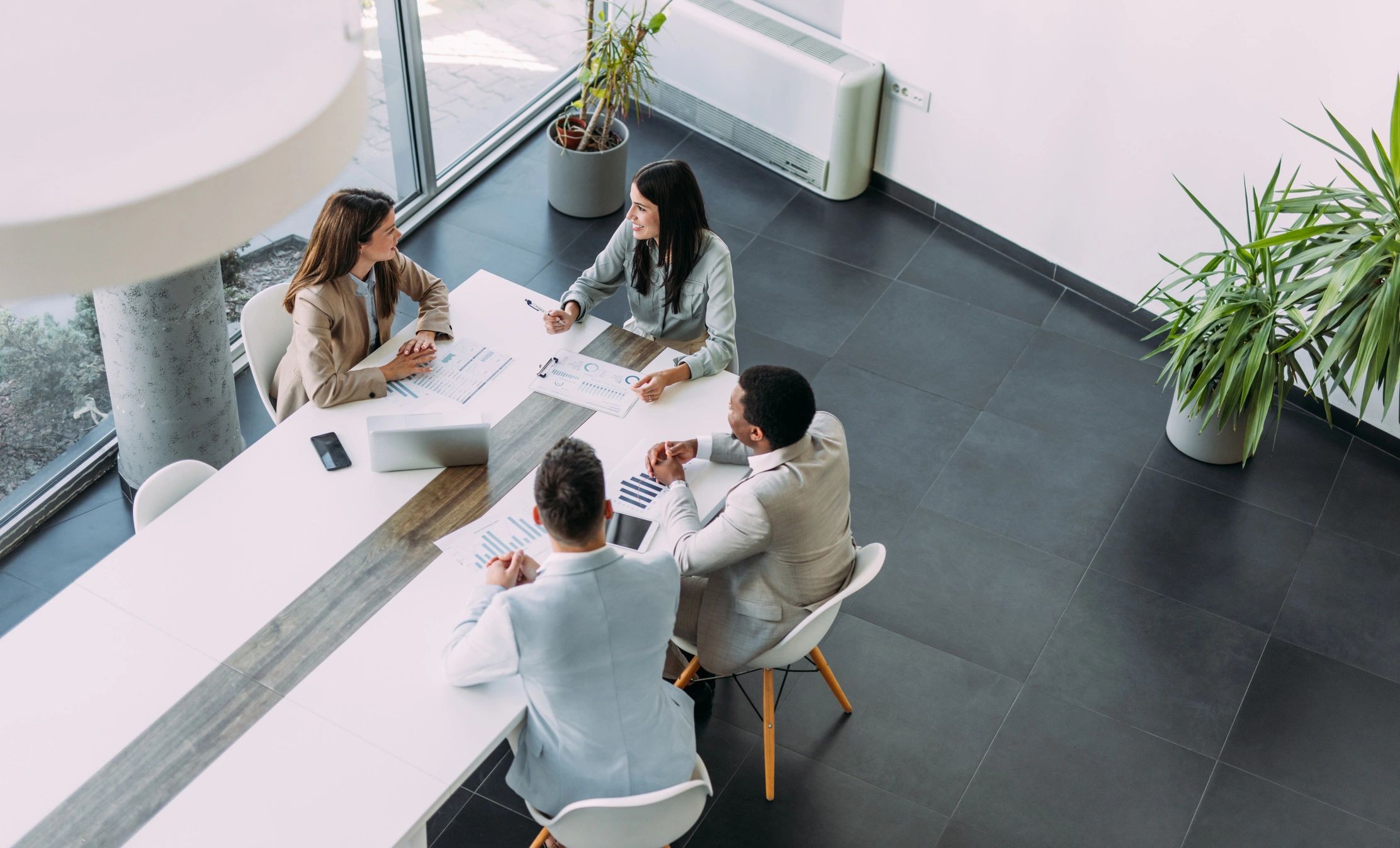 Group of business professionals in a boardroom meeting